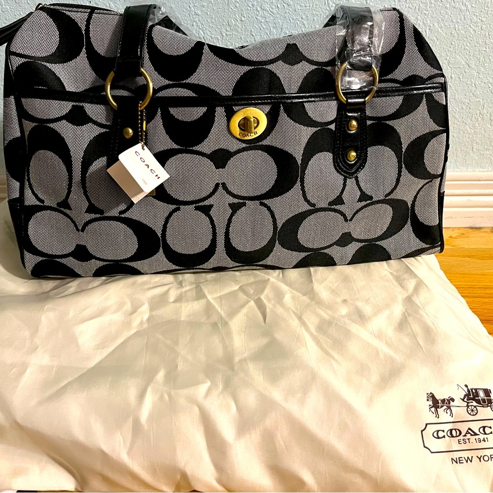 Brand New Authentic Coach Purse with dust bag.
